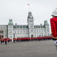A graduating Cadet stands at attention as the Royal Military College of Canada Cadet Wing perform a Feu de Joie to salute the graduating class in Kingston , 15 May 2015.